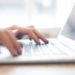 Person checking laptop